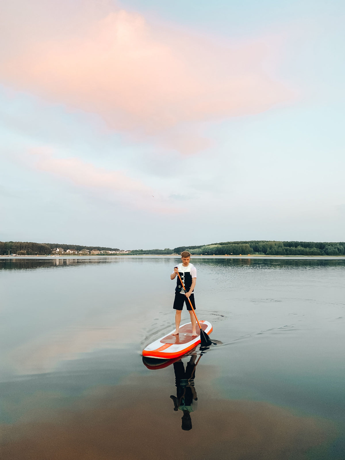 Paddle boarding photo for Paddle boarding in Canmore: Best Lakes to Visit & Why Renting in Calgary Saves You Money