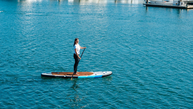 Paddle boarding photo for 4.75" vs 6" Paddle Boards: Which Thickness Is Best for Beginners?