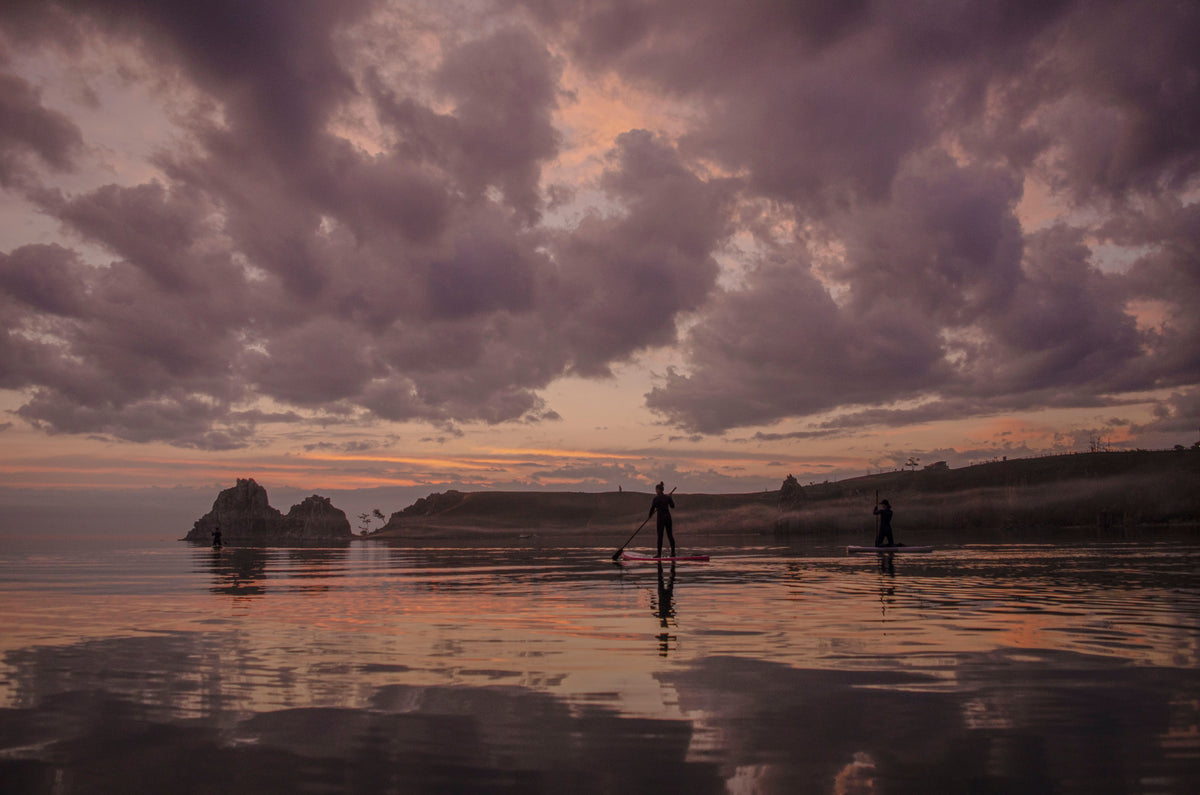 Paddle boarding photo for Aqua Marina Paddle Boards Review and Comparable Inflatable SUP Options